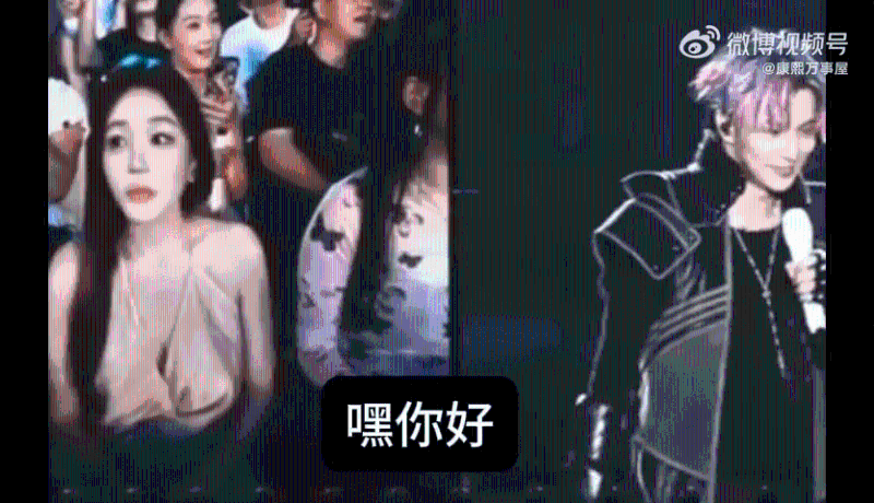 镜头就转到台下一位衣着性感的美女歌迷。 镜头就转到台下一位衣着性感的美女歌迷。