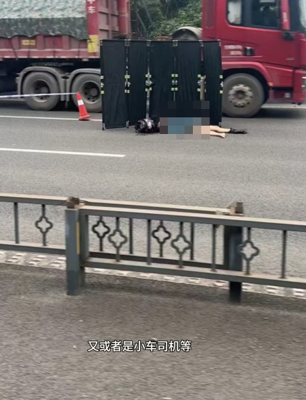 电单车乘客倒在地上。 电单车乘客倒在地上。