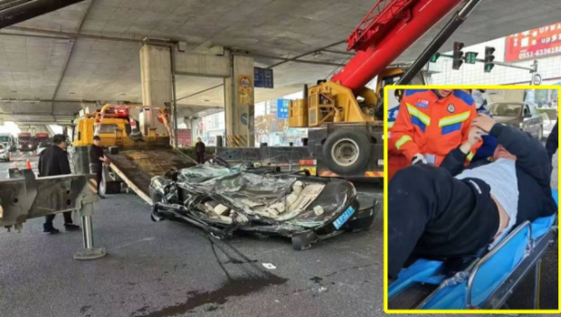 安徽私家车被压成“车饼” 安徽私家车被压成“车饼”