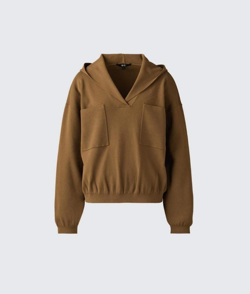 C春夏设计师联名系列连帽针织上衣 $249,以嫘萦物料制成。 C春夏设计师联名系列连帽针织上衣 $249,以嫘萦物料制成。