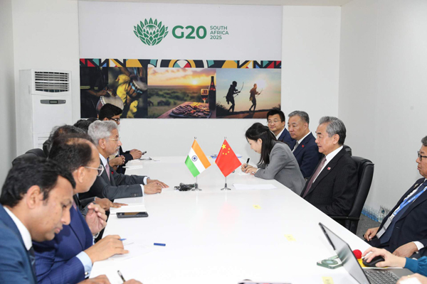 王毅和苏杰生举行会谈。 王毅和苏杰生举行会谈。