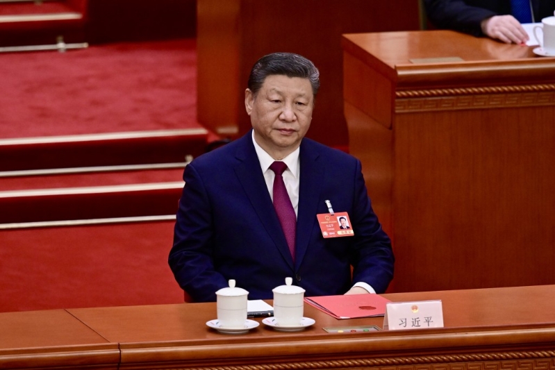 国家主席习近平出席十四届全国人大三次会议闭幕会。 刘骏轩摄 国家主席习近平出席十四届全国人大三次会议闭幕会。 刘骏轩摄