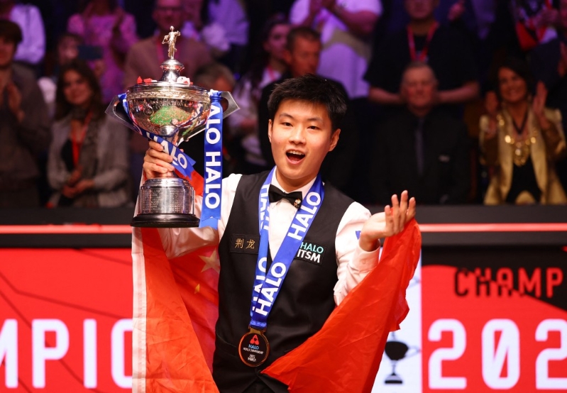 赵心童夺冠后,成为赛事史上首位封王的业余球手,以及首位称霸的中国球手。路透社.jpg 赵心童夺冠后,成为赛事史上首位封王的业余球手,以及首位称霸的中国球手。路透社.jpg