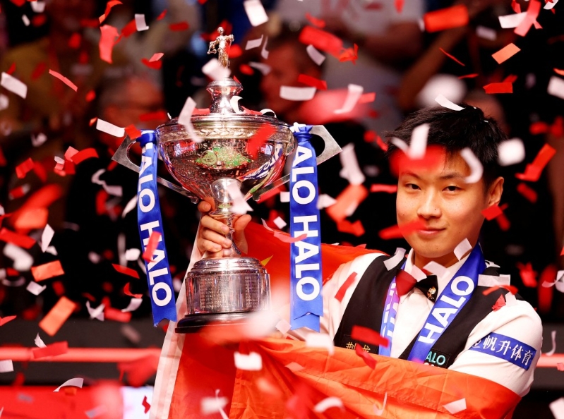 赵心童夺冠后,成为赛事史上首位封王的业余球手,以及首位称霸的中国球手。 路透社.jpg 赵心童夺冠后,成为赛事史上首位封王的业余球手,以及首位称霸的中国球手。 路透社.jpg