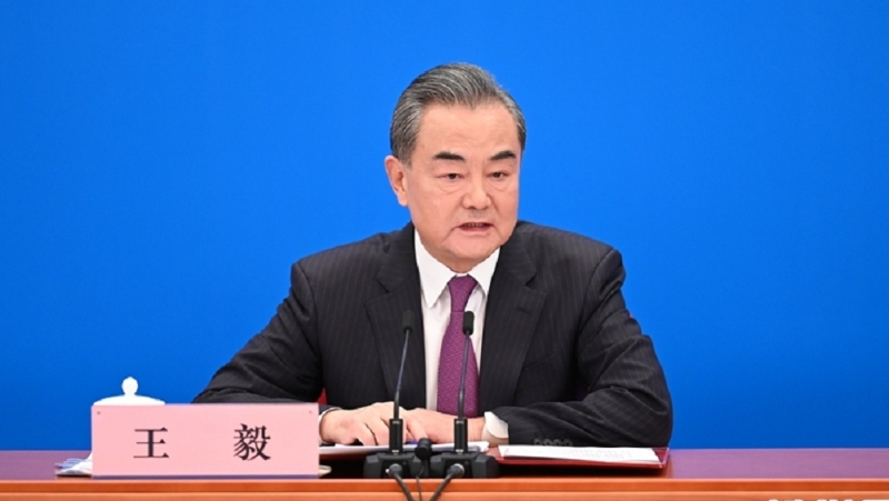 中共中央政治局委员、外交部长王毅。新华社 中共中央政治局委员、外交部长王毅。新华社