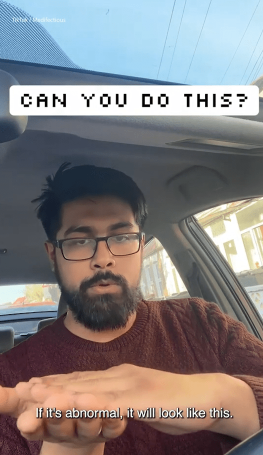 将一只手快速在另一手掌上来回翻转。 将一只手快速在另一手掌上来回翻转。