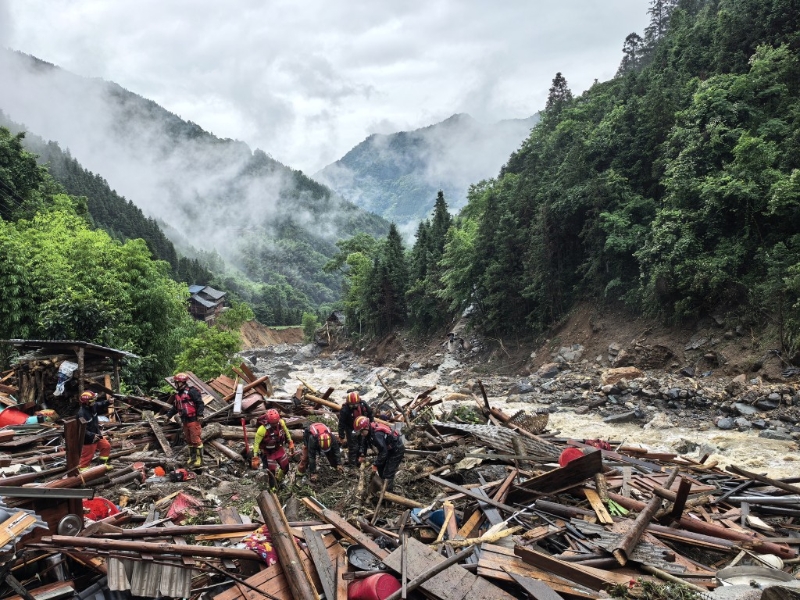 广西桂林市龙胜县泗水乡三舍村突发山洪泥石流灾害。 中新社 广西桂林市龙胜县泗水乡三舍村突发山洪泥石流灾害。 中新社