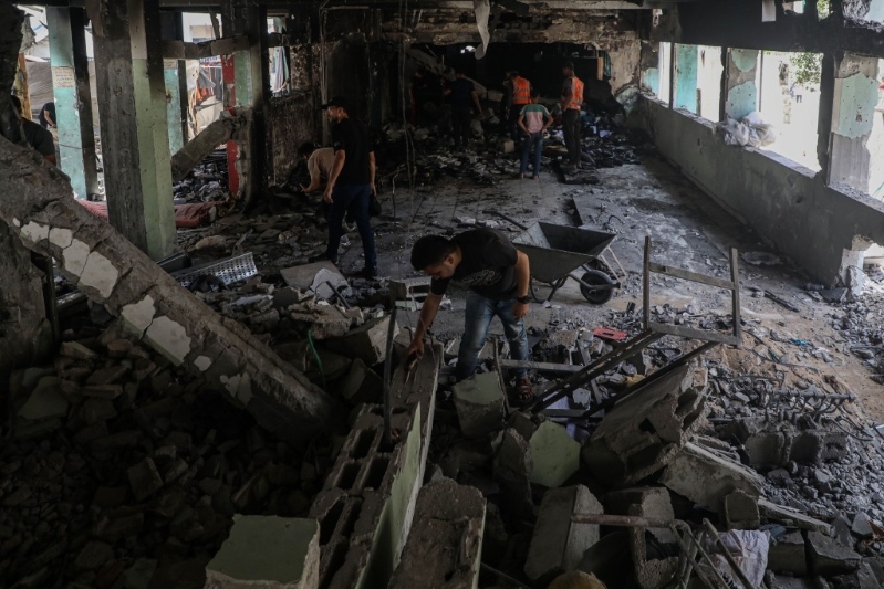 加沙城贾贾维学校遭以军轰炸,沦为废墟,酿36人死亡。新华社 加沙城贾贾维学校遭以军轰炸,沦为废墟,酿36人死亡。新华社