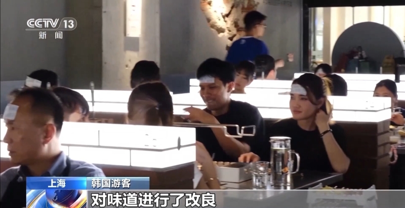 韩国游客尝试中国菜 韩国游客尝试中国菜