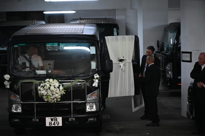 何柱国大殓仪式周日早上举行 何柱国大殓仪式周日早上举行