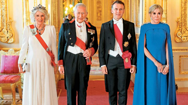 马克龙夫妇到温莎堡出席国宴,获英皇查理斯三世伉俪欢迎。 法新社 马克龙夫妇到温莎堡出席国宴,获英皇查理斯三世伉俪欢迎。 法新社