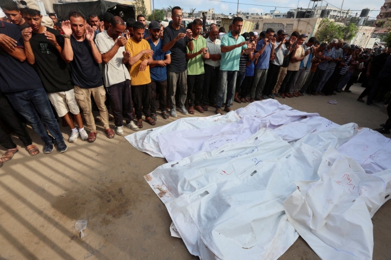 路透社记者见到多具遗体。路透社 路透社记者见到多具遗体。路透社