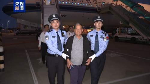 “百名红通人员”梁锦文回国投案 “百名红通人员”梁锦文回国投案