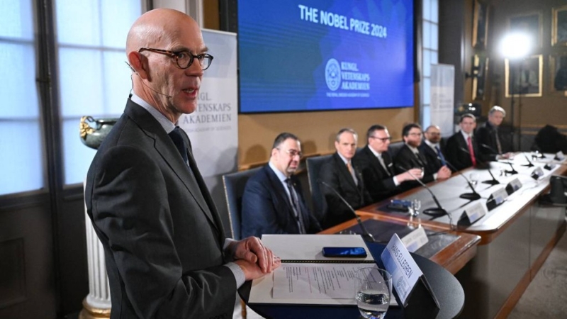 负责颁发诺贝尔物理、化学及经济奖的瑞典皇家科学院秘书长艾利格伦 负责颁发诺贝尔物理、化学及经济奖的瑞典皇家科学院秘书长艾利格伦