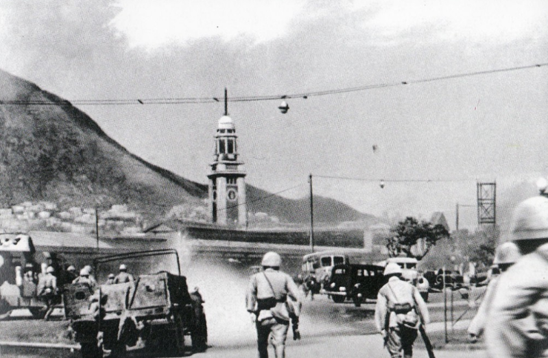 12月12日早上,日军攻入尖沙咀,前方为尖沙咀钟楼 12月12日早上,日军攻入尖沙咀,前方为尖沙咀钟楼