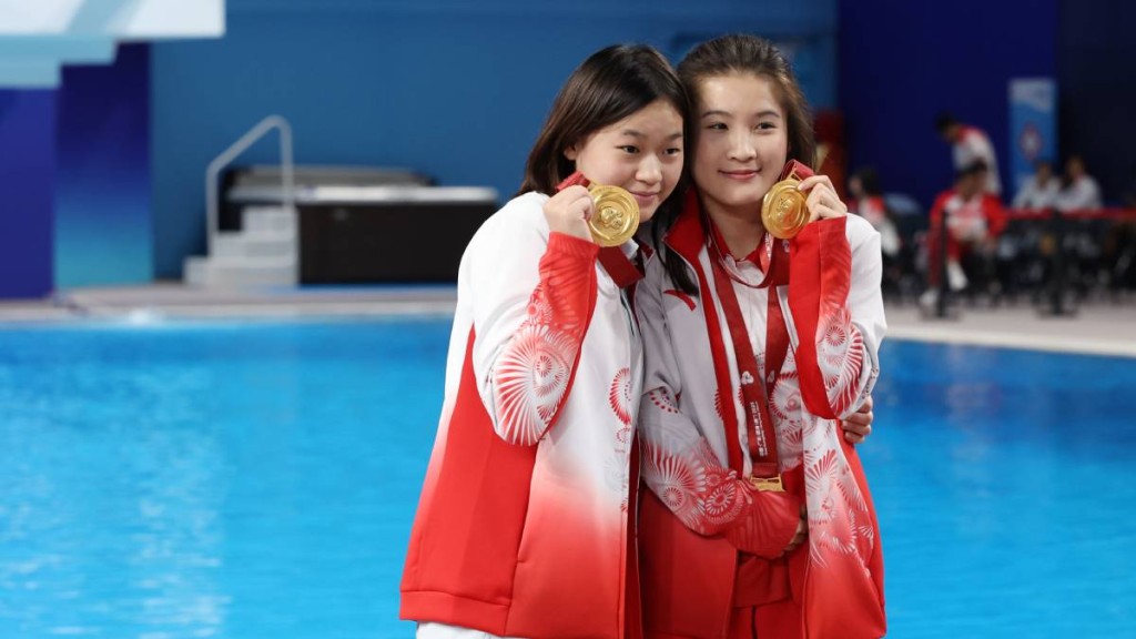 图为她去年参加第十五届全国运动会情况 图为她去年参加第十五届全国运动会情况